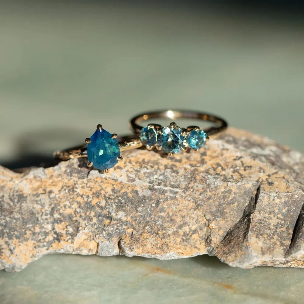 0.82ct Songea and Nigerian Teal Sapphire Three Stone Ring in 14K Yellow Gold