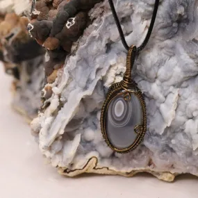 Botswana Agate Pendant with Antique Brass Wrap