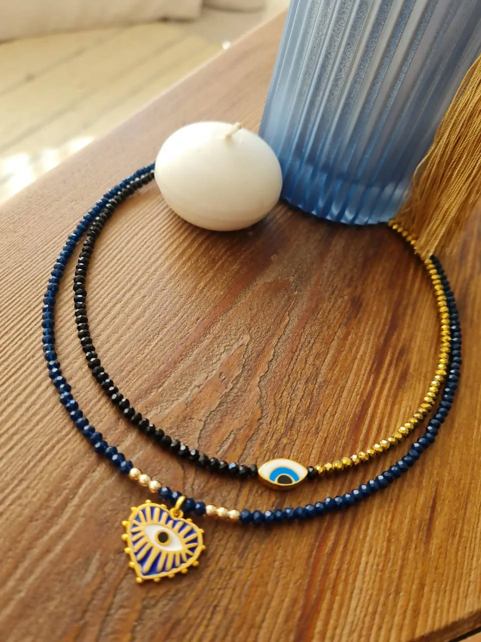 choker half black half gold with evileye