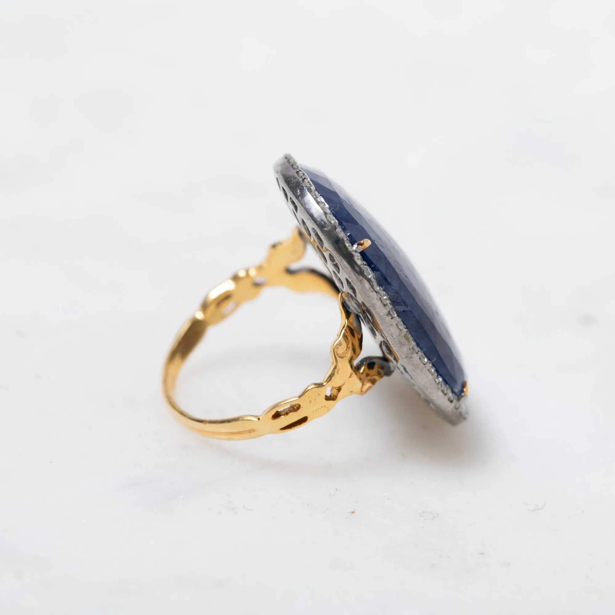 Faceted Sapphire in Diamonds Ring