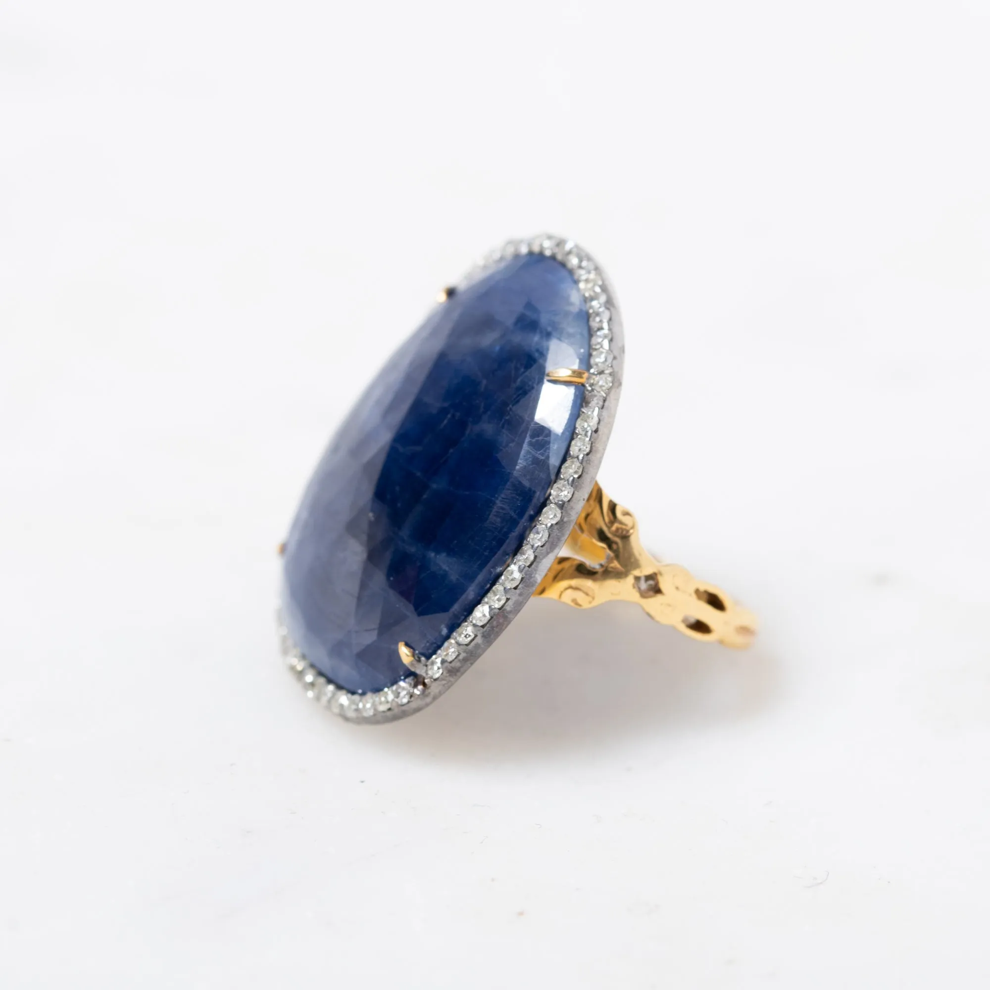 Faceted Sapphire in Diamonds Ring