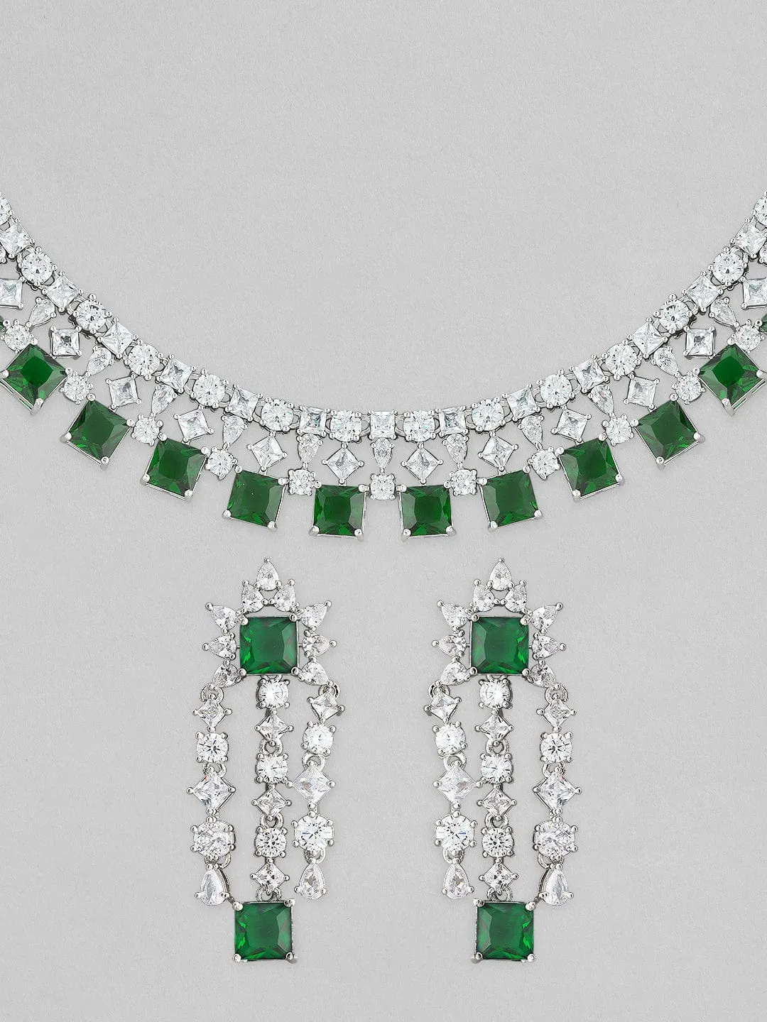 Rubans Silver Plated Necklace Set With American Diamonds And Green Stones.